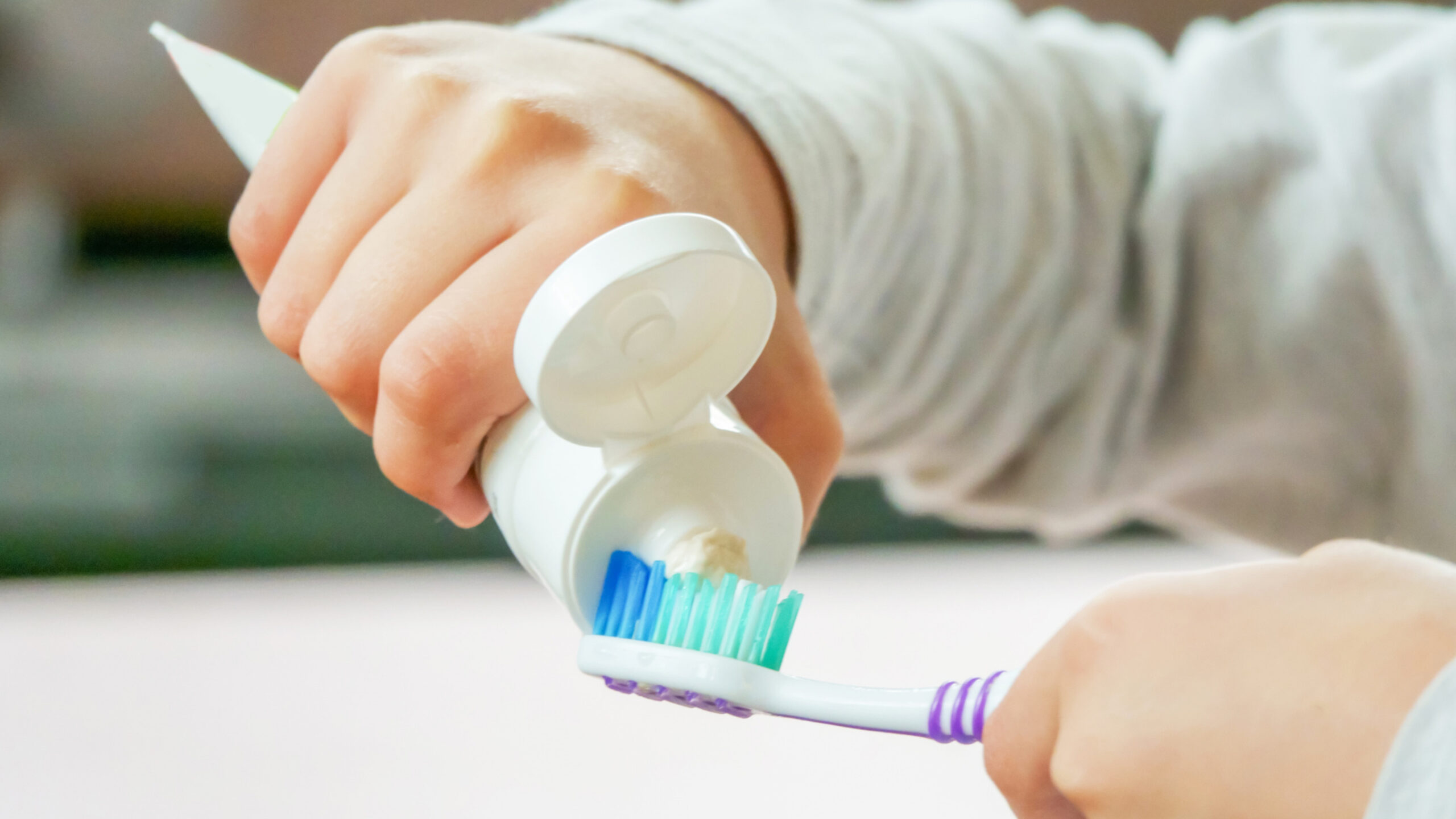 best water flosser reviews - dental water flosser for braces, oral hygiene on a bathroom table
